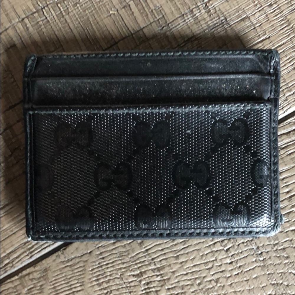 Black Gucci men’s wallet